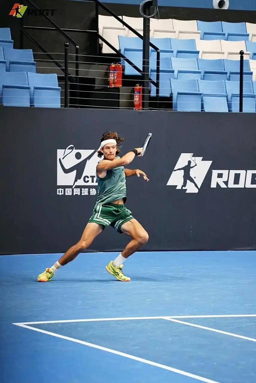 Matt Dellavedova playing tennis